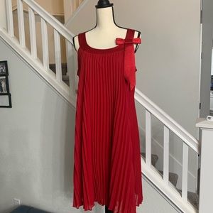 Red pleated dress